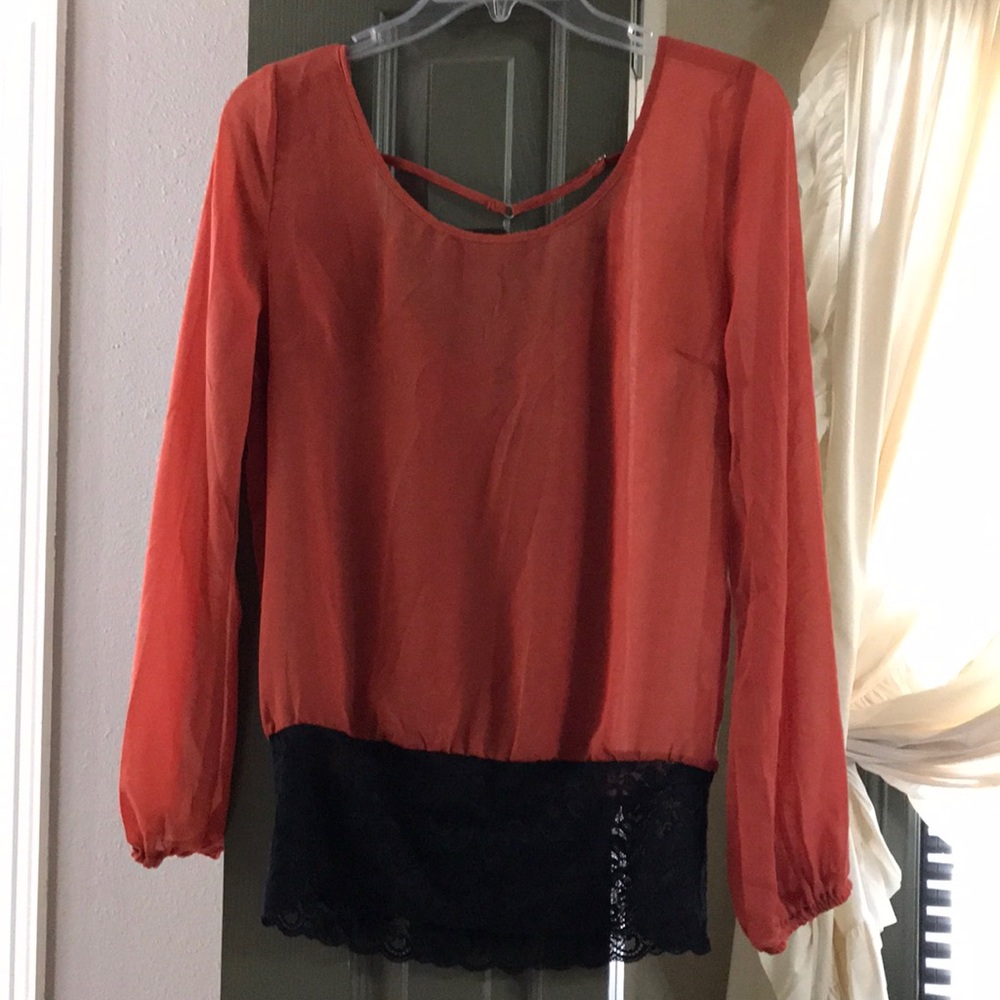 Pretty sheer top with lace detail